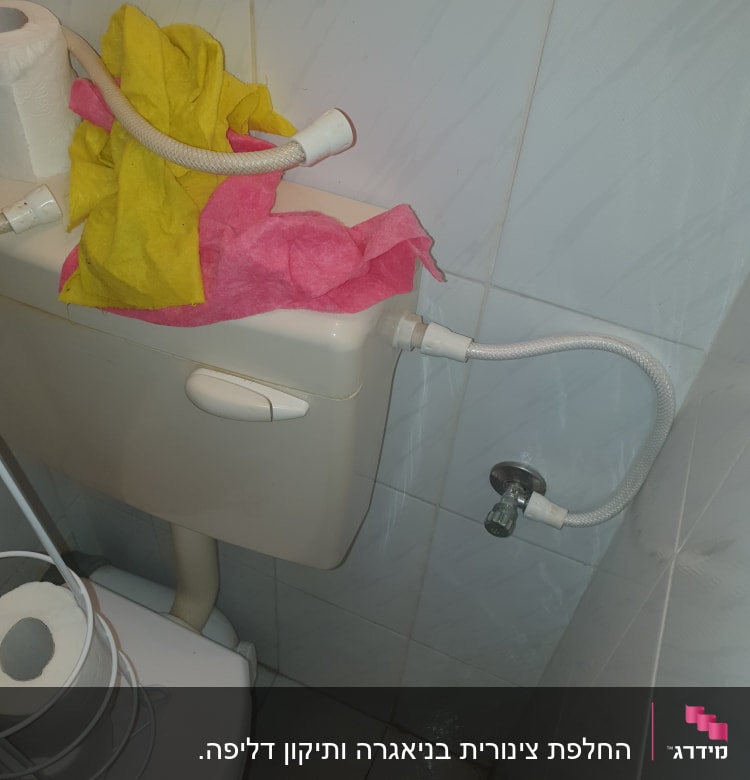 צינור מים מחובר לניאגרה עם ברז